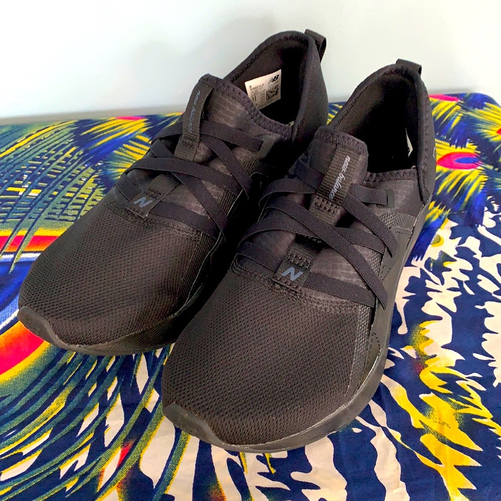 New Balance black athletic slip on